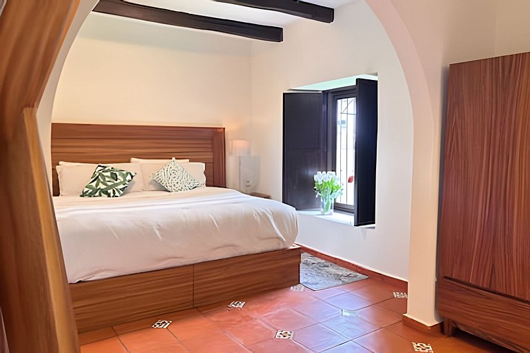 Suite entre árboles y fogata