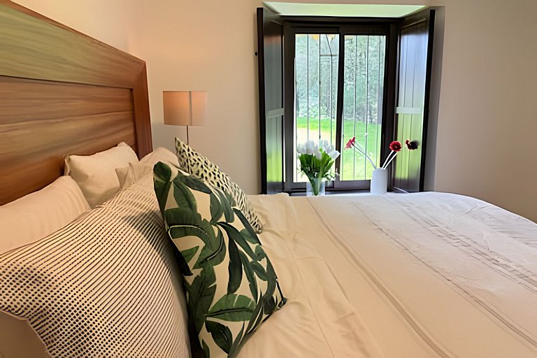 Suite entre árboles y fogata